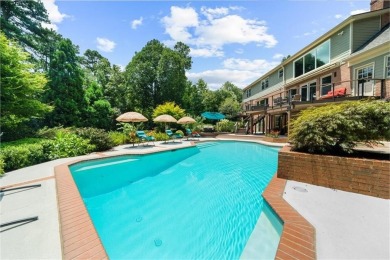 Nestled on a private, one-acre lot just moments from Highway 400 on Cherokee Town and Country Club in Georgia - for sale on GolfHomes.com, golf home, golf lot