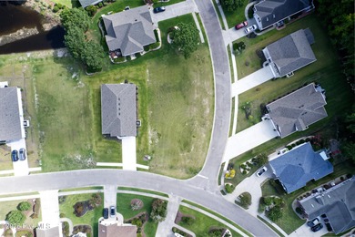 Build your dream home on this spacious 0.24-acre corner lot in on Brunswick Plantation and Golf Resorts in North Carolina - for sale on GolfHomes.com, golf home, golf lot