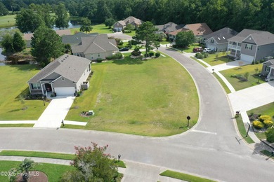Build your dream home on this spacious 0.24-acre corner lot in on Brunswick Plantation and Golf Resorts in North Carolina - for sale on GolfHomes.com, golf home, golf lot