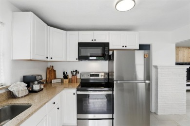 This adorable 2 bed/1 bath home is picture perfect! Fully on Hidden Lakes Golf Club in Florida - for sale on GolfHomes.com, golf home, golf lot