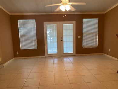 THIS TRIPLE WIDE LAKE FRONT HOME LOCATED IN THE ALL AGES SILVER on Silver Dollar Golf and Trap Club in Florida - for sale on GolfHomes.com, golf home, golf lot