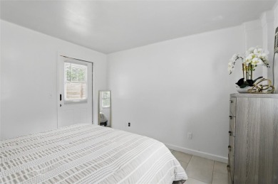 This adorable 2 bed/1 bath home is picture perfect! Fully on Hidden Lakes Golf Club in Florida - for sale on GolfHomes.com, golf home, golf lot