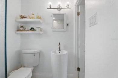 This adorable 2 bed/1 bath home is picture perfect! Fully on Hidden Lakes Golf Club in Florida - for sale on GolfHomes.com, golf home, golf lot