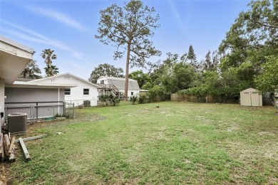 This adorable 2 bed/1 bath home is picture perfect! Fully on Hidden Lakes Golf Club in Florida - for sale on GolfHomes.com, golf home, golf lot