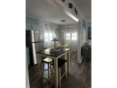 Coastal cottage two bedroom modernly furnished in the award on Prestwick Country Club in South Carolina - for sale on GolfHomes.com, golf home, golf lot