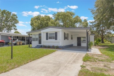 This adorable fully renovated manufactured home is the perfect on Silver Lake Executive Golf Course in Florida - for sale on GolfHomes.com, golf home, golf lot