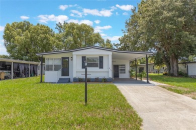 This adorable fully renovated manufactured home is the perfect on Silver Lake Executive Golf Course in Florida - for sale on GolfHomes.com, golf home, golf lot