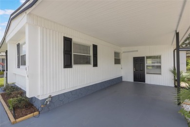 This adorable fully renovated manufactured home is the perfect on Silver Lake Executive Golf Course in Florida - for sale on GolfHomes.com, golf home, golf lot