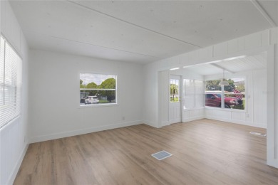 This adorable fully renovated manufactured home is the perfect on Silver Lake Executive Golf Course in Florida - for sale on GolfHomes.com, golf home, golf lot