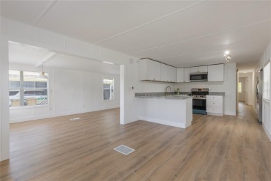 This adorable fully renovated manufactured home is the perfect on Silver Lake Executive Golf Course in Florida - for sale on GolfHomes.com, golf home, golf lot