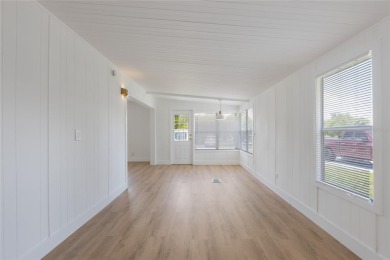 This adorable fully renovated manufactured home is the perfect on Silver Lake Executive Golf Course in Florida - for sale on GolfHomes.com, golf home, golf lot