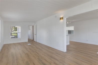 This adorable fully renovated manufactured home is the perfect on Silver Lake Executive Golf Course in Florida - for sale on GolfHomes.com, golf home, golf lot