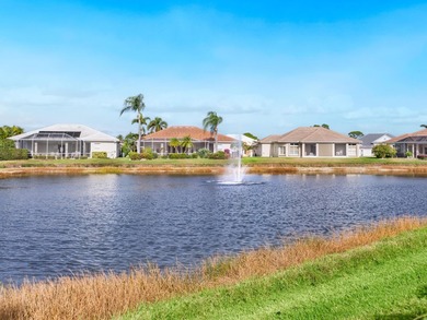 Enjoy sparkling lake and fountain views from this charming Lido on Pelican Pointe Golf and Country Club in Florida - for sale on GolfHomes.com, golf home, golf lot