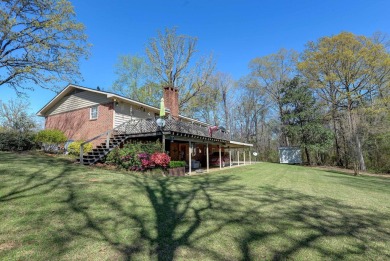 The 4 bedroom, 3 bath ranch style home you're interested in is a on Choctaw Country Club in Alabama - for sale on GolfHomes.com, golf home, golf lot