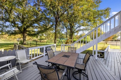 This beautiful home features wide porches and wrap-around on Idabel Country Club in Oklahoma - for sale on GolfHomes.com, golf home, golf lot