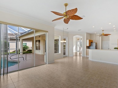 Enjoy sparkling lake and fountain views from this charming Lido on Pelican Pointe Golf and Country Club in Florida - for sale on GolfHomes.com, golf home, golf lot