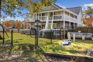 This beautiful home features wide porches and wrap-around on Idabel Country Club in Oklahoma - for sale on GolfHomes.com, golf home, golf lot