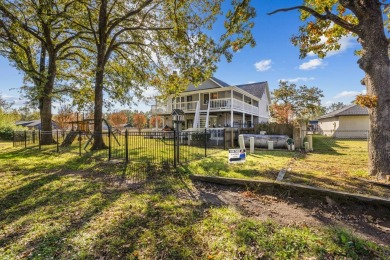 This beautiful home features wide porches and wrap-around on Idabel Country Club in Oklahoma - for sale on GolfHomes.com, golf home, golf lot