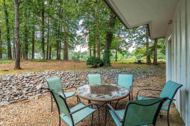 Perfectly Move-In Ready! Step into Spanish-style charm in this on DeSoto Golf Course in Arkansas - for sale on GolfHomes.com, golf home, golf lot