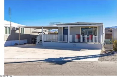 **ON LEASED LAND** If Affordable ISLAND living in desireable on Havasu Island Golf Course in Arizona - for sale on GolfHomes.com, golf home, golf lot