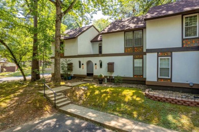 Perfectly Move-In Ready! Step into Spanish-style charm in this on DeSoto Golf Course in Arkansas - for sale on GolfHomes.com, golf home, golf lot