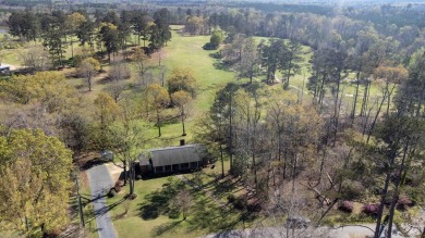 The 4 bedroom, 3 bath ranch style home you're interested in is a on Choctaw Country Club in Alabama - for sale on GolfHomes.com, golf home, golf lot