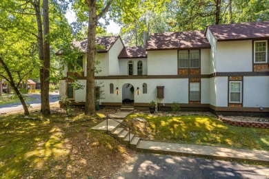 Perfectly Move-In Ready! Step into Spanish-style charm in this on DeSoto Golf Course in Arkansas - for sale on GolfHomes.com, golf home, golf lot