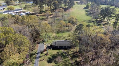 The 4 bedroom, 3 bath ranch style home you're interested in is a on Choctaw Country Club in Alabama - for sale on GolfHomes.com, golf home, golf lot