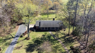 The 4 bedroom, 3 bath ranch style home you're interested in is a on Choctaw Country Club in Alabama - for sale on GolfHomes.com, golf home, golf lot