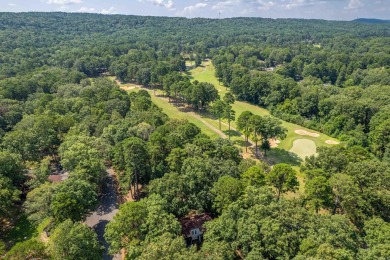 Perfectly Move-In Ready! Step into Spanish-style charm in this on DeSoto Golf Course in Arkansas - for sale on GolfHomes.com, golf home, golf lot