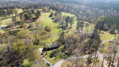 The 4 bedroom, 3 bath ranch style home you're interested in is a on Choctaw Country Club in Alabama - for sale on GolfHomes.com, golf home, golf lot