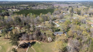 The 4 bedroom, 3 bath ranch style home you're interested in is a on Choctaw Country Club in Alabama - for sale on GolfHomes.com, golf home, golf lot