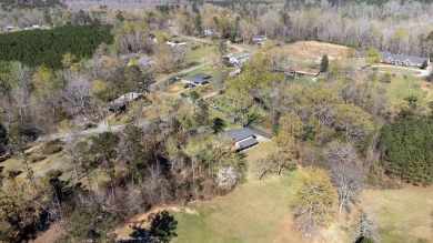 The 4 bedroom, 3 bath ranch style home you're interested in is a on Choctaw Country Club in Alabama - for sale on GolfHomes.com, golf home, golf lot