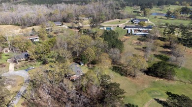 The 4 bedroom, 3 bath ranch style home you're interested in is a on Choctaw Country Club in Alabama - for sale on GolfHomes.com, golf home, golf lot