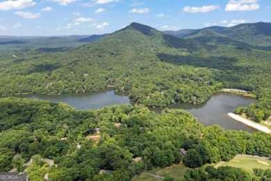 Escape the city hustle to your own lake front, mountain retreat on Bent Tree Golf Course in Georgia - for sale on GolfHomes.com, golf home, golf lot