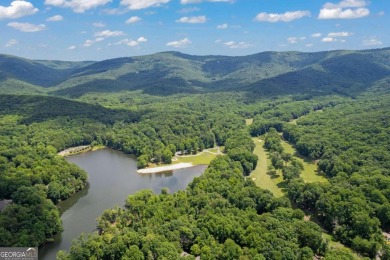 Escape the city hustle to your own lake front, mountain retreat on Bent Tree Golf Course in Georgia - for sale on GolfHomes.com, golf home, golf lot