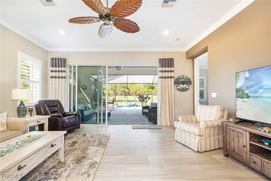 The stunning saltwater pool is the focal point of this exquisite on Pelican Preserve Golf Club in Florida - for sale on GolfHomes.com, golf home, golf lot