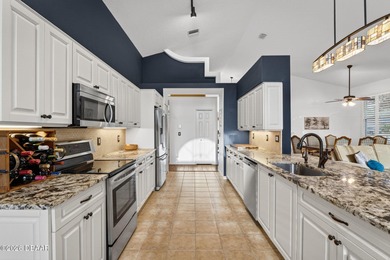 LAKEFRONT fountain views set the tone for this exceptional POOL on Plantation Bay Golf and Country Club in Florida - for sale on GolfHomes.com, golf home, golf lot