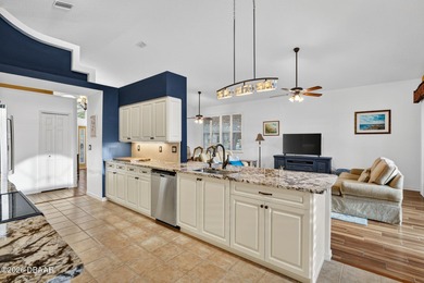 LAKEFRONT fountain views set the tone for this exceptional POOL on Plantation Bay Golf and Country Club in Florida - for sale on GolfHomes.com, golf home, golf lot