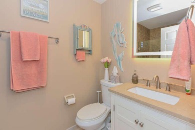 This charming home sits pretty on an oversized lot with stunning on Eagle Wood Golf Course in Florida - for sale on GolfHomes.com, golf home, golf lot