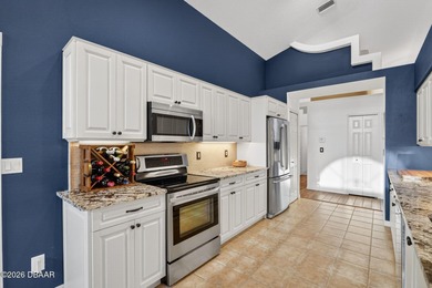 LAKEFRONT fountain views set the tone for this exceptional POOL on Plantation Bay Golf and Country Club in Florida - for sale on GolfHomes.com, golf home, golf lot