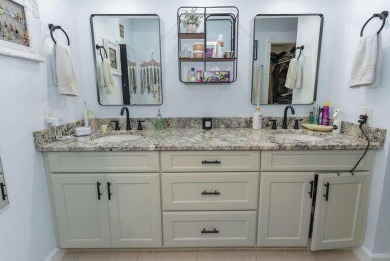 This charming home sits pretty on an oversized lot with stunning on Eagle Wood Golf Course in Florida - for sale on GolfHomes.com, golf home, golf lot