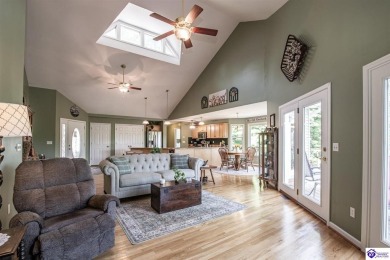 Lakefront Living at Its Finest! This stunning ranch-style home on Doe Valley Country Club in Kentucky - for sale on GolfHomes.com, golf home, golf lot