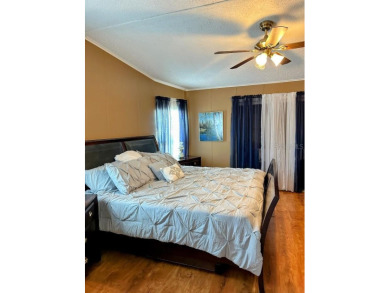 Welcome to Paradise! Paradise island is a 55+ active community on Fairway Village Golf Course in Florida - for sale on GolfHomes.com, golf home, golf lot
