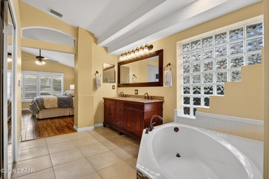 LAKEFRONT fountain views set the tone for this exceptional POOL on Plantation Bay Golf and Country Club in Florida - for sale on GolfHomes.com, golf home, golf lot