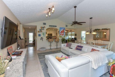 This charming home sits pretty on an oversized lot with stunning on Eagle Wood Golf Course in Florida - for sale on GolfHomes.com, golf home, golf lot