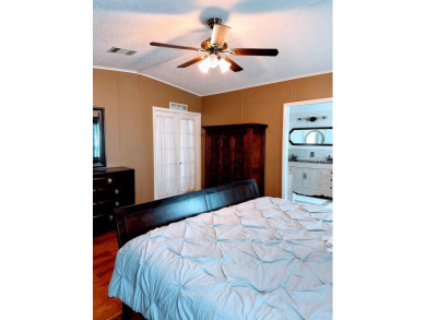 Welcome to Paradise! Paradise island is a 55+ active community on Fairway Village Golf Course in Florida - for sale on GolfHomes.com, golf home, golf lot