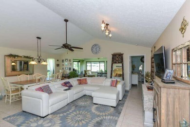 This charming home sits pretty on an oversized lot with stunning on Eagle Wood Golf Course in Florida - for sale on GolfHomes.com, golf home, golf lot