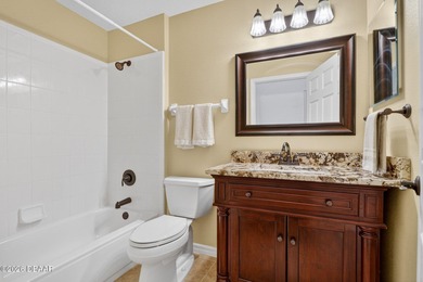 LAKEFRONT fountain views set the tone for this exceptional POOL on Plantation Bay Golf and Country Club in Florida - for sale on GolfHomes.com, golf home, golf lot