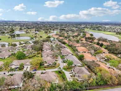 Experience the perfect blend of comfort and style in this on Falcon Watch Golf Club in Florida - for sale on GolfHomes.com, golf home, golf lot